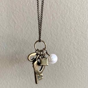 Necklace with key and heart and pearl charms